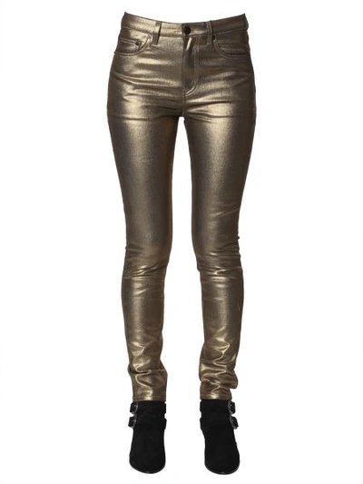Shop Saint Laurent Skinny Fit Jeans In Gold
