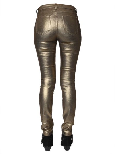 Shop Saint Laurent Skinny Fit Jeans In Gold