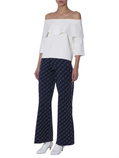 Shop Stella Mccartney Knitted Monogram Trousers In Blue