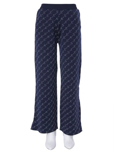 Shop Stella Mccartney Knitted Monogram Trousers In Blue