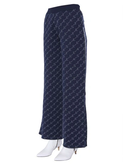 Shop Stella Mccartney Knitted Monogram Trousers In Blue