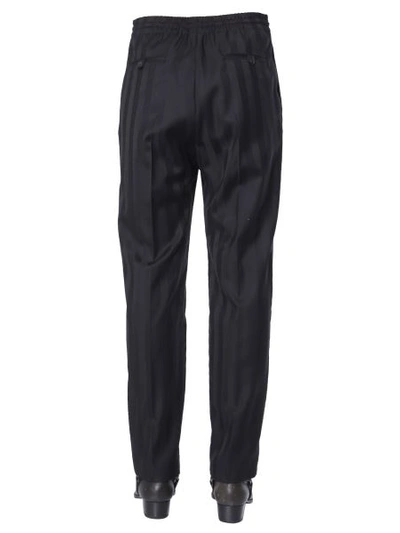 Shop Saint Laurent Striped Jogger Pants In Black