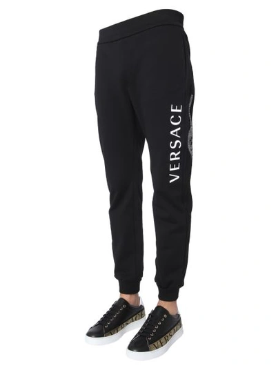 Shop Versace Cotton Sweatpants In Black