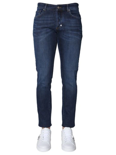 Shop Versace New Fit Jeans In Blue