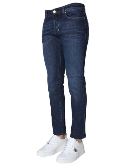 Shop Versace New Fit Jeans In Blue