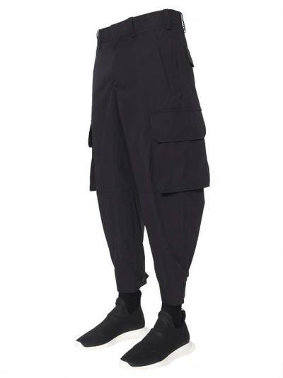 Shop Neil Barrett Cargo Trousers In Black