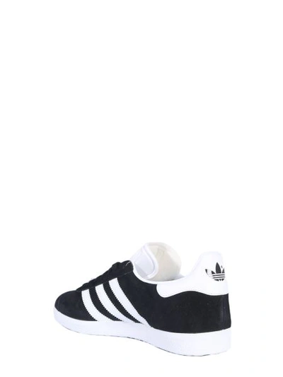 Shop Adidas Originals Gazzelle Sneakers In Black