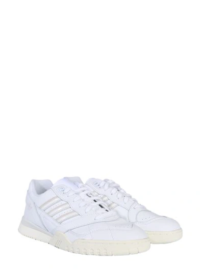 Shop Adidas Originals A.r. Trainer Sneakers In White