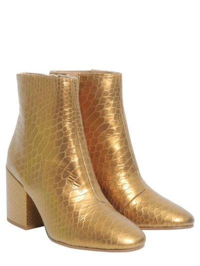 Shop Sam Edelman Snake Printed Ankle Boots In Gold