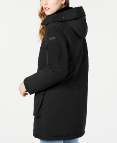 Shop Bcbgeneration Faux-fur Trim Hooded Anorak Puffer Coat In Black