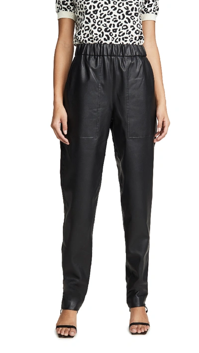 Shop Tibi Faux Leather Joggers In Black