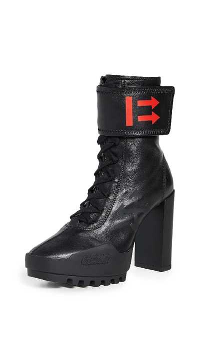 Shop Off-white Heeled Moto Wrap Boots In Black