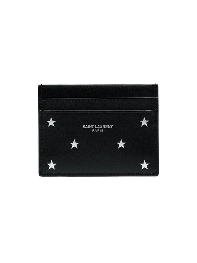 Shop Saint Laurent Star Embossed Cardholder In Black