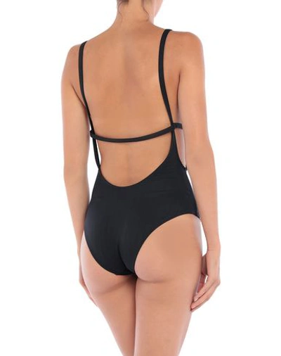 Shop Sophie Deloudi One-piece Swimsuits In Black