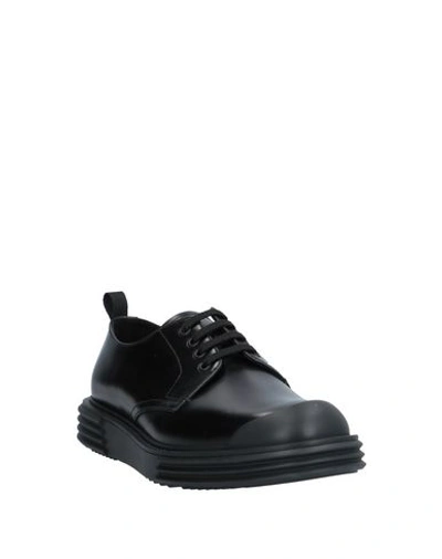 Shop Prada Sneakers In Black