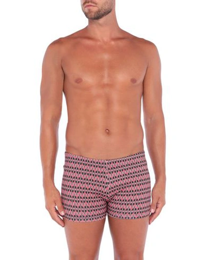 Shop Moschino Swim Trunks In Coral
