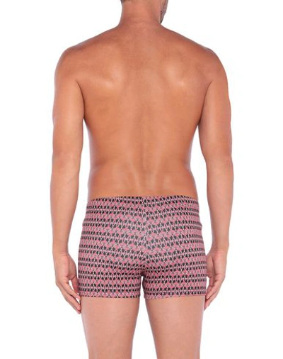 Shop Moschino Swim Trunks In Coral