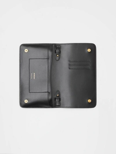 Shop Burberry Grainy Leather Phone Wallet With Strap In Black