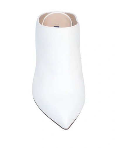 Shop Stuart Weitzman Mules & Clogs In White