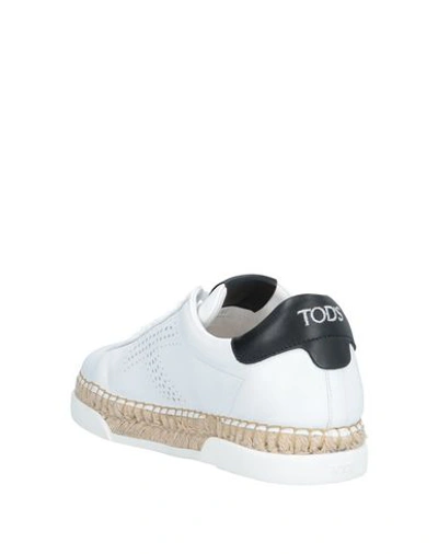 Shop Tod's Sneakers In White