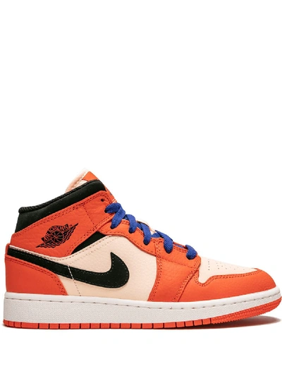 Shop Jordan Air  1 Mid Sneakers In Orange