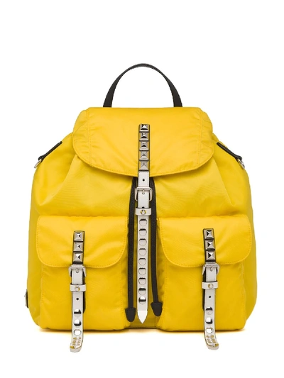 Shop Prada Studded Detail Backpack In Yellow