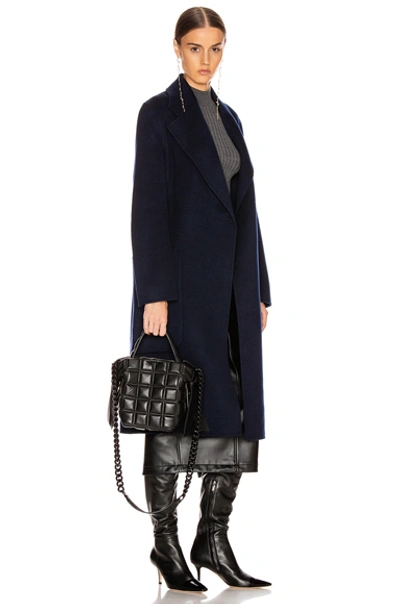 Shop Acne Studios Mini Quilted Musubi Bag In Black