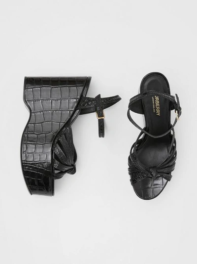 Shop Burberry Knot Detail Embossed Leather Platform Wedges In Black