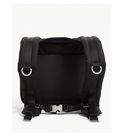 Shop Prada Rubberised-logo Shell Backpack In Black