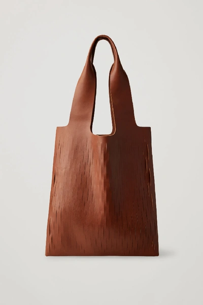 Shop Cos Cutout Leather Tote In Beige