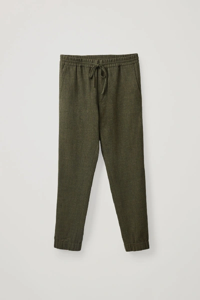 Shop Cos Drawstring Wool Crepe Trousers In Green