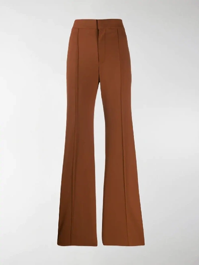 Shop Chloé High-waisted Flared Trousers In Brown