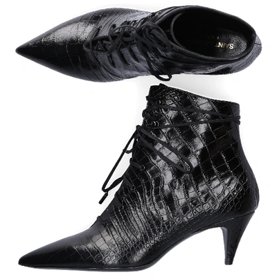 Shop Saint Laurent Ankle Boots Black Kiki 55