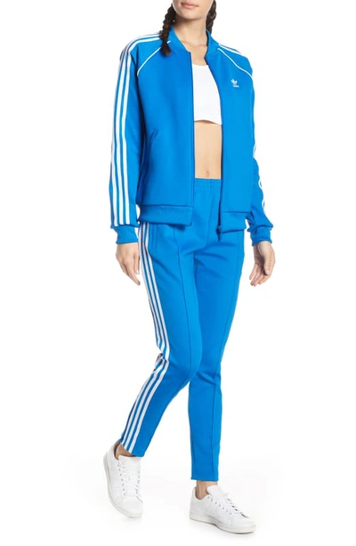 Shop Adidas Originals Adidas Sst Track Pants In Bluebird
