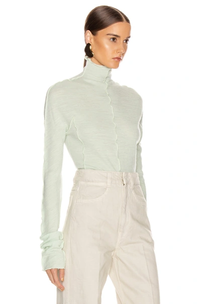 Shop Jil Sander High Neck Long Sleeve Top In Pale Blue