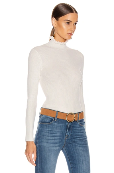 Shop Frame Ruffle Turtleneck Sweater In White In Off White