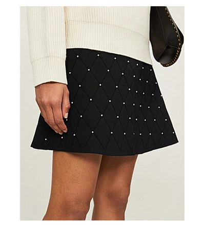 Shop Sandro Pearl-embellished Stretch-knit Mini Skirt In Black