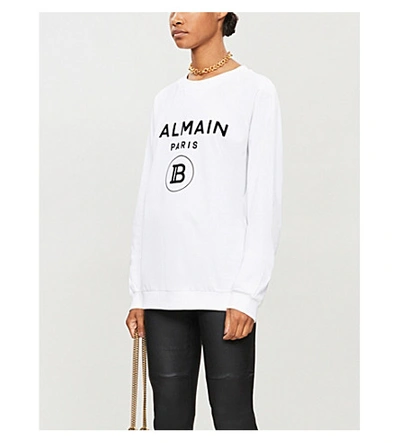 Shop Balmain Logo-print Cotton-jersey Sweatshirt In Noir/blanc