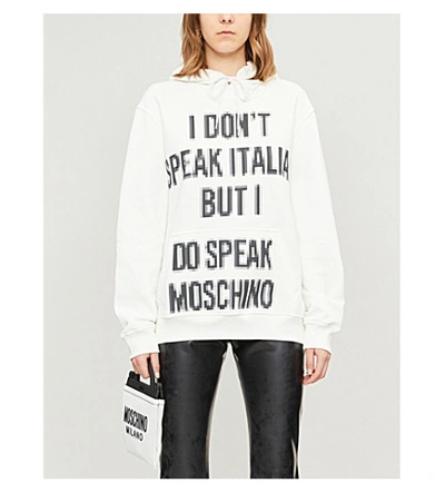 Shop Moschino Slogan-print Cotton Hoody In White