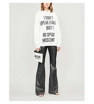 Shop Moschino Slogan-print Cotton Hoody In White