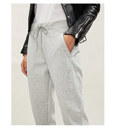 Shop Armani Exchange Logo-embossed Stretch-jersey Jogging Bottoms In Grey