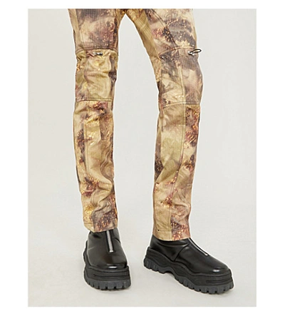 Shop Alyx Gaiter Camouflage-print Slim-fit Shell Trousers In Camo Green