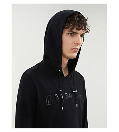 Shop Balmain Logo-print Cotton-jersey Hoody In Black