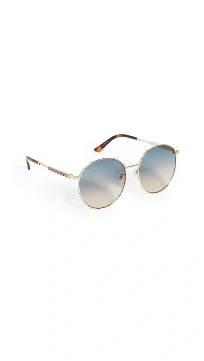 Shop Gucci Sensual Romanticism Round Sunglasses In Gold/gold/blue