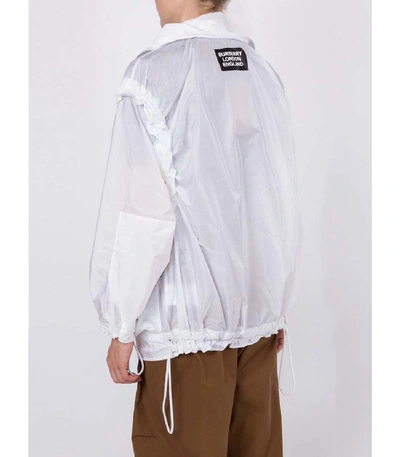 Shop Burberry Drawcord Detail Logo Print Lightweight Jacket In White