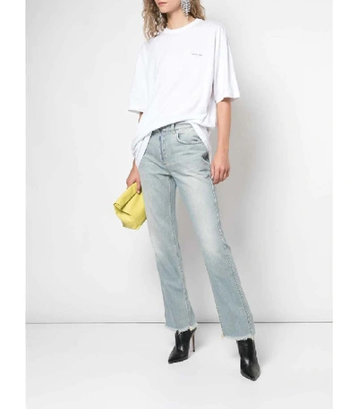 Shop Givenchy Flared Distressed Light Blue Jeans