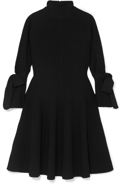 Shop Carolina Herrera Bow-detailed Ribbed-knit Mini Dress In Black