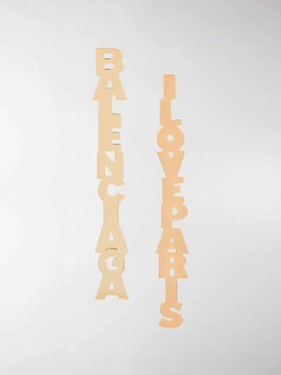 Shop Balenciaga Lettering Pendant Earrings In Gold