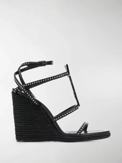 Shop Saint Laurent Cassandra 105 Wedge Sandals In Black