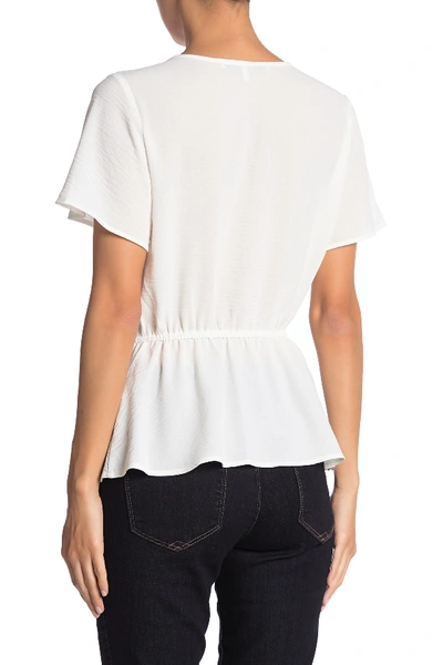 Shop Collective Concepts V-neck Button Peplum Blouse In Winter White
